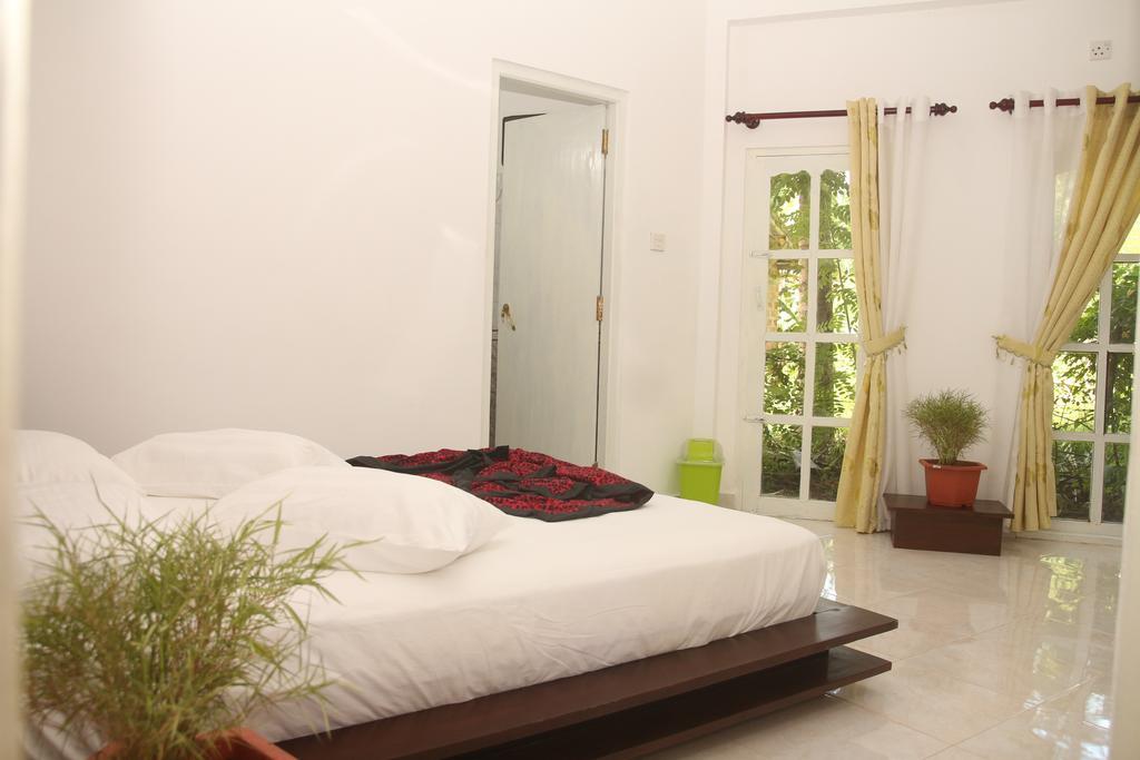 Sanovin Hotel Mirissa Pokoj fotografie